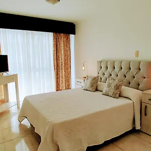 https://mendoza-suites-1.hotelsmendoza.com